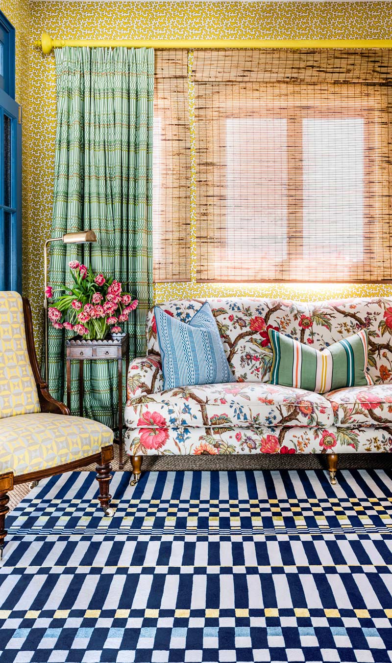 location living room shot of otto rug by anna spiro in navy and white geometric pattern