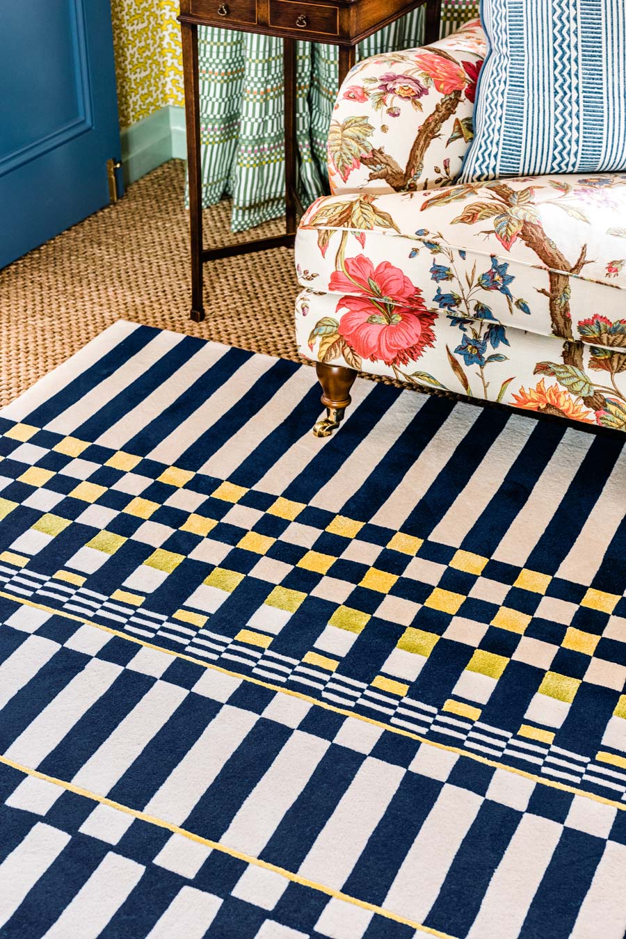 close up shot of otto rug by anna spiro in navy and white geometric pattern