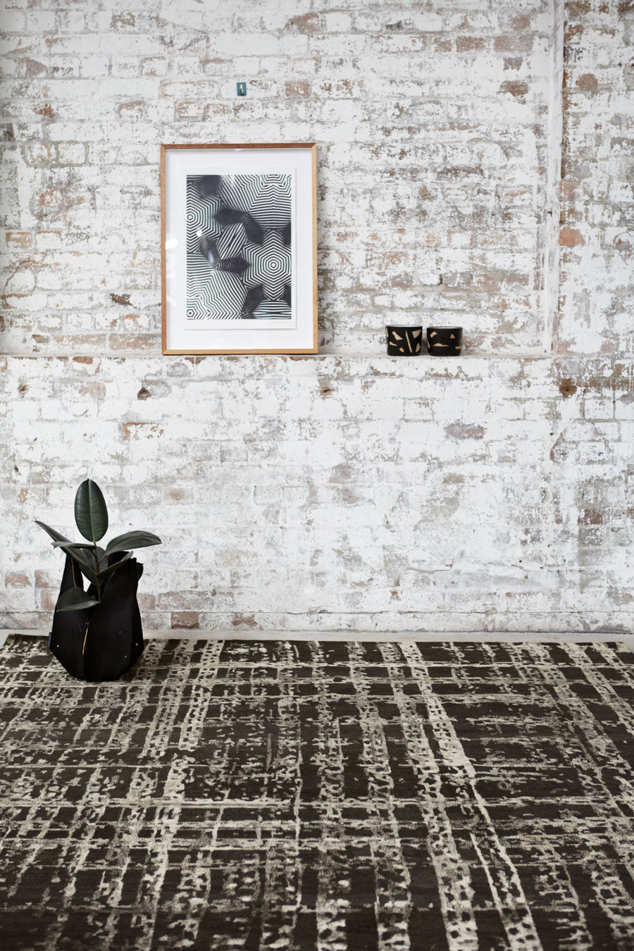 Styled image of textured Twine rug by Hare + Klein in brown colour