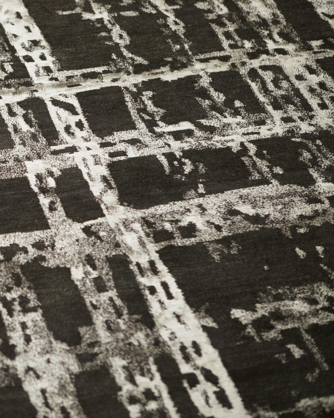 Detailed image of textured Twine rug by Hare + Klein in brown colour